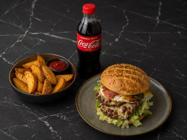Don Burger + Potato Wedges + Cola 0.5 – jetzt in Graz bestellen