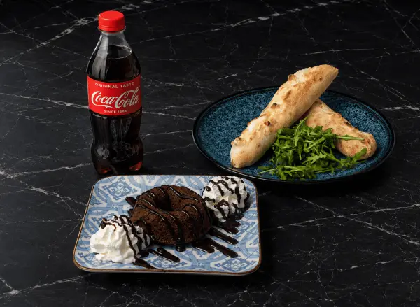 Pizzastangerl + Mohr im Hemd + Cola 0.5 – jetzt in Graz bestellen